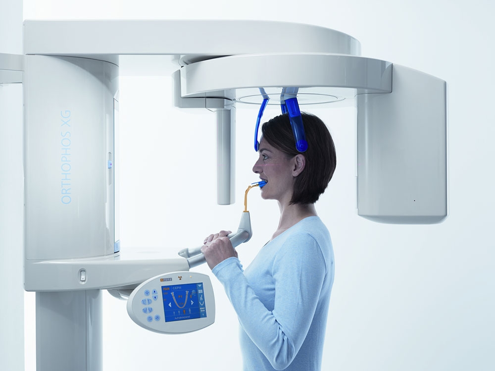 girl getting mouth x-rayed