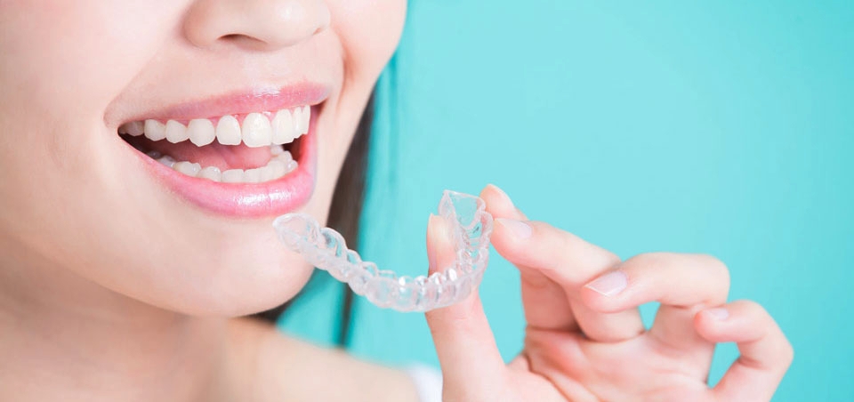girl smiling with invisalign